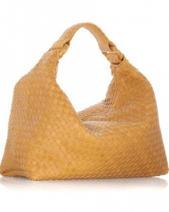 Hobo Bag: a large crescent-shaped shoulder bag or any large bag that hangs from your shoulder and has a main compartment closure (unlike the "tote" which is normally open top).