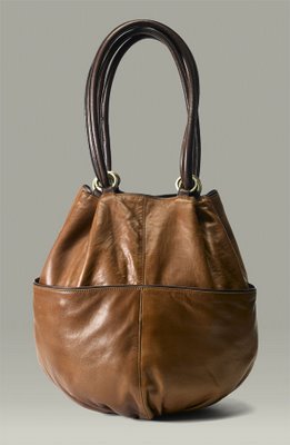 Bucket bag: roomy bag shaped like a bucket, usually has an open top and shoulder strap.