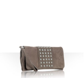 Wristlet - a clutch shaped bag that comes with an attached leather or bracelet-looking strap allowing you to hold your bag and dance freely.